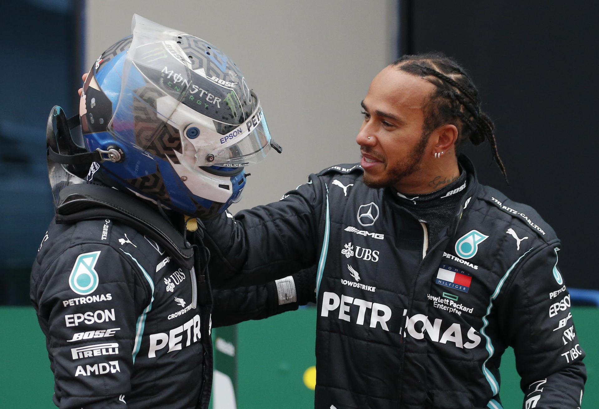 Valtteri Bottas is consoled by Lewis Hamilton after the Turkish Grand Prix