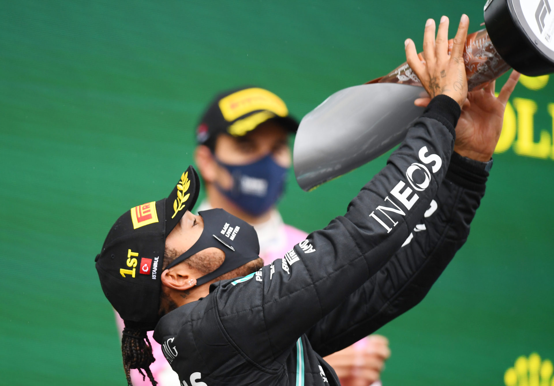 Lewis Hamilton celebrating atop podium at Istanbul Park