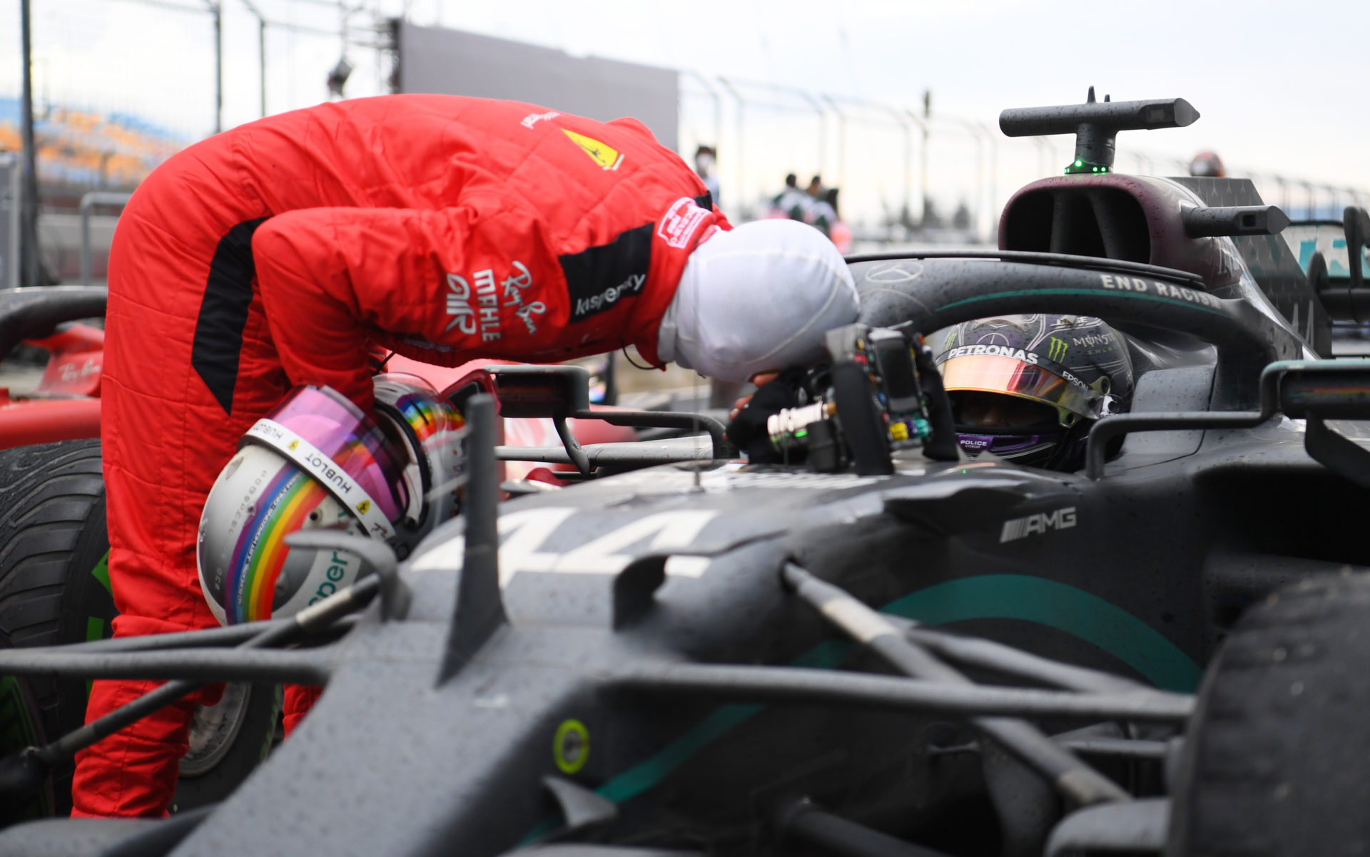 Sebastian Vettel congratulates Lewis Hamilton after the Briton won his 7th championship