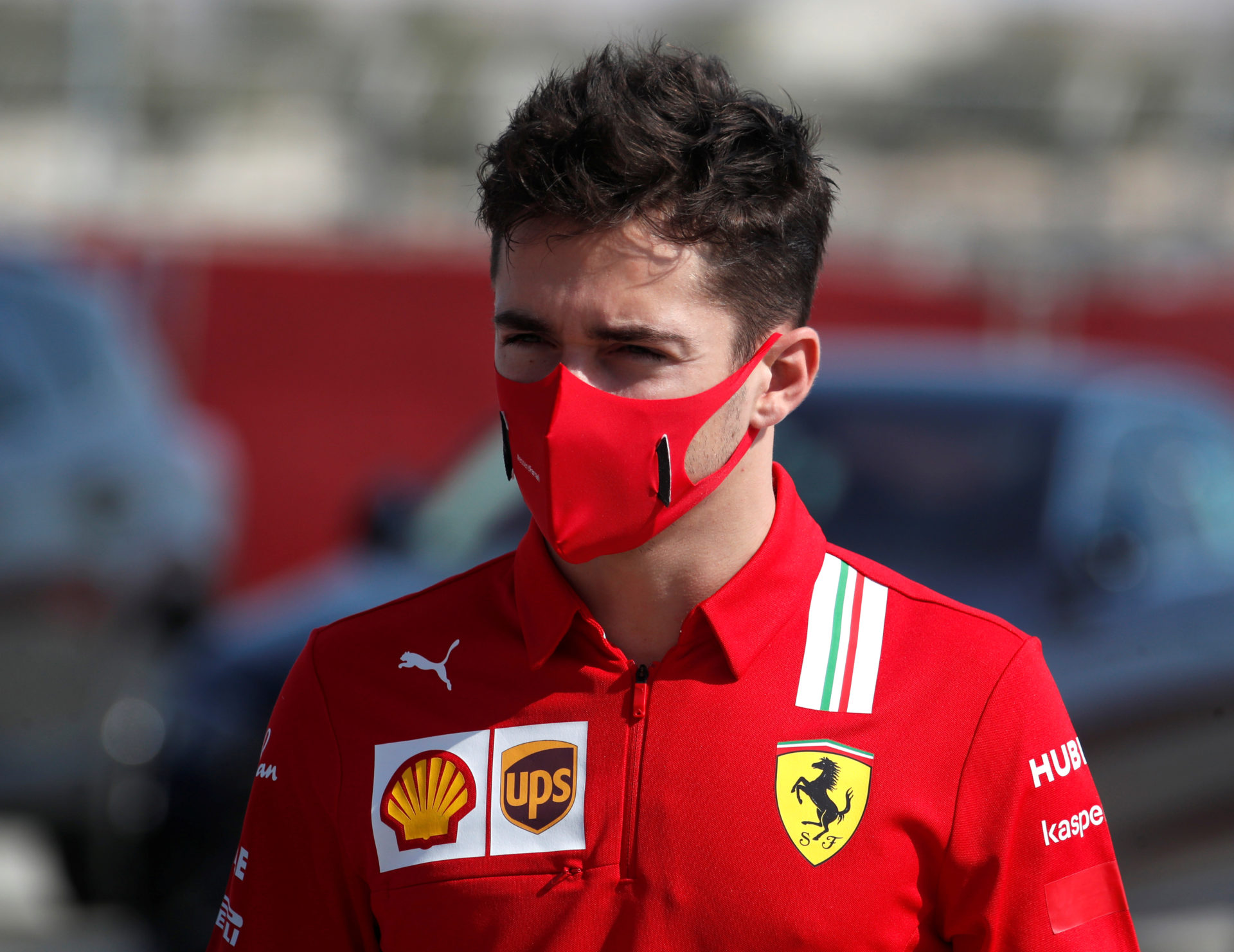 Ferrari driver Charles Leclerc walking around the paddock at Bahrain Grand Prix 2020