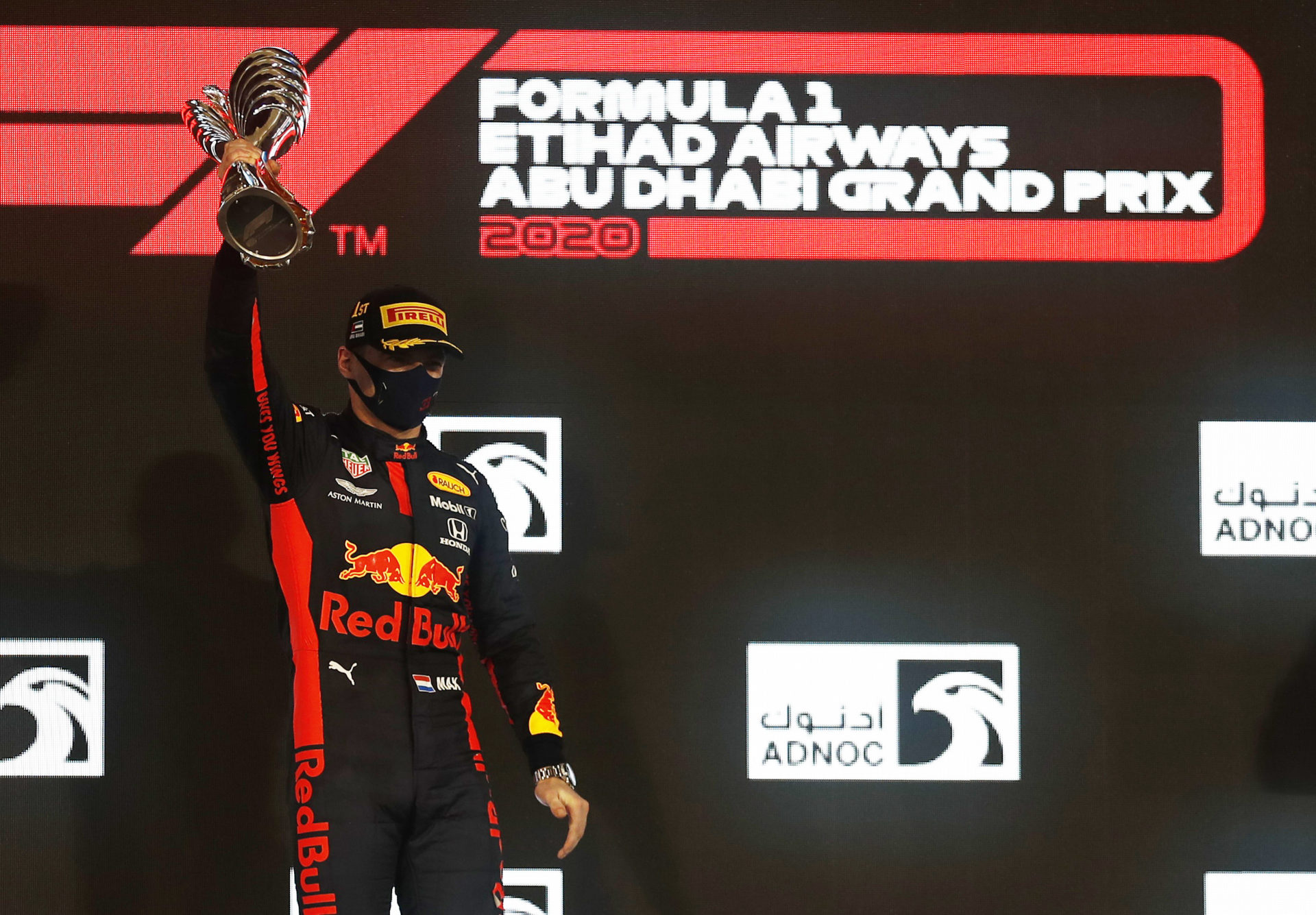 Red Bull racer Max Verstappen celebrating at the top of the podium