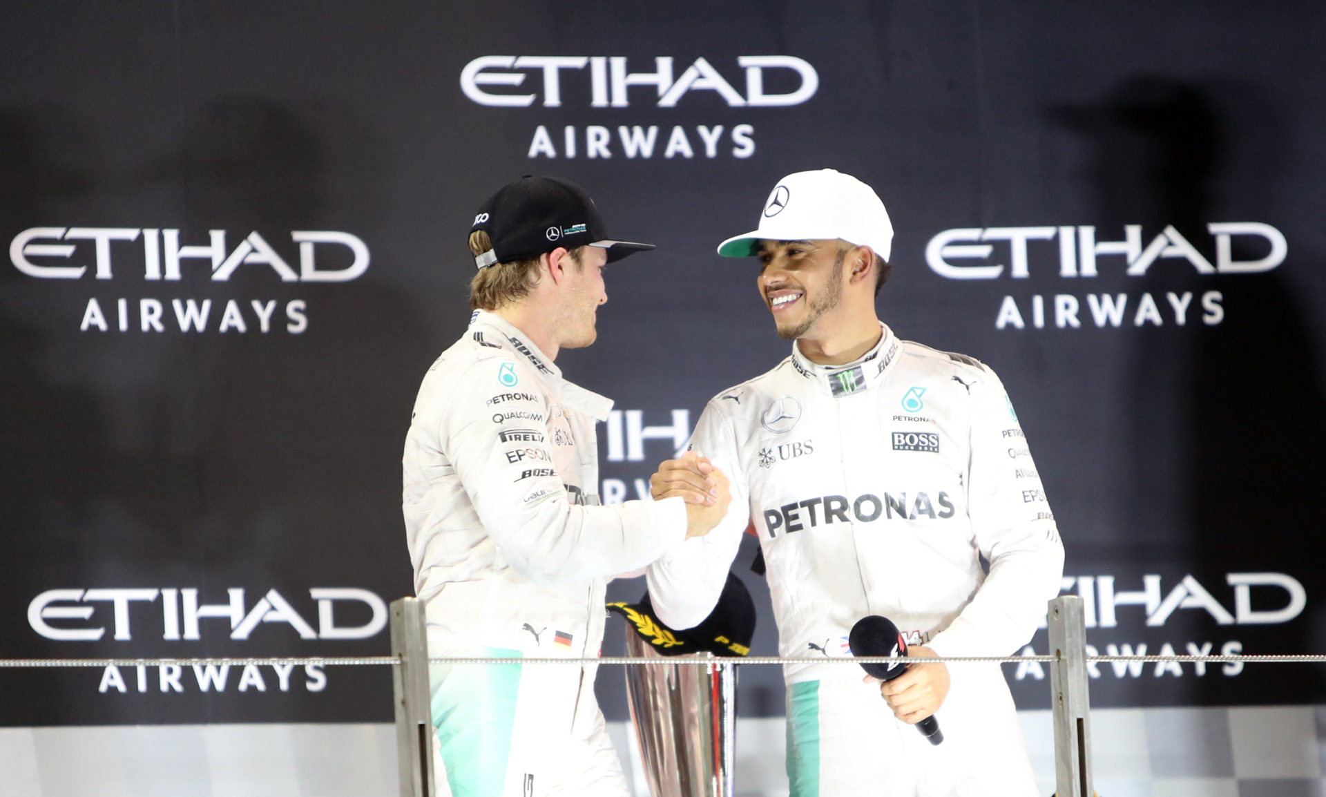 Lewis Hamilton and Nico Rosberg celebrating podium finishes at the Bahrain GP