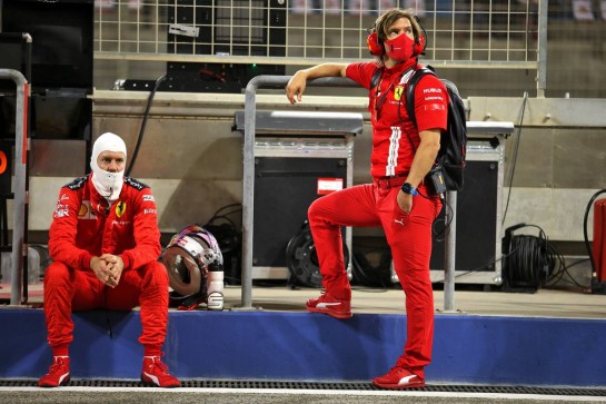 Sebastian Vettel (GER) Ferrari with Antti Kontsas (FIN) Personal Trainer in the pits while the race is stopped.
29.11.2020. Formula 1 World Championship, Rd 15, Bahrain Grand Prix, Sakhir, Bahrain, Race Day.
- www.xpbimages.com, EMail: requests@xpbimages.com &copy; Copyright: Charniaux / XPB Images