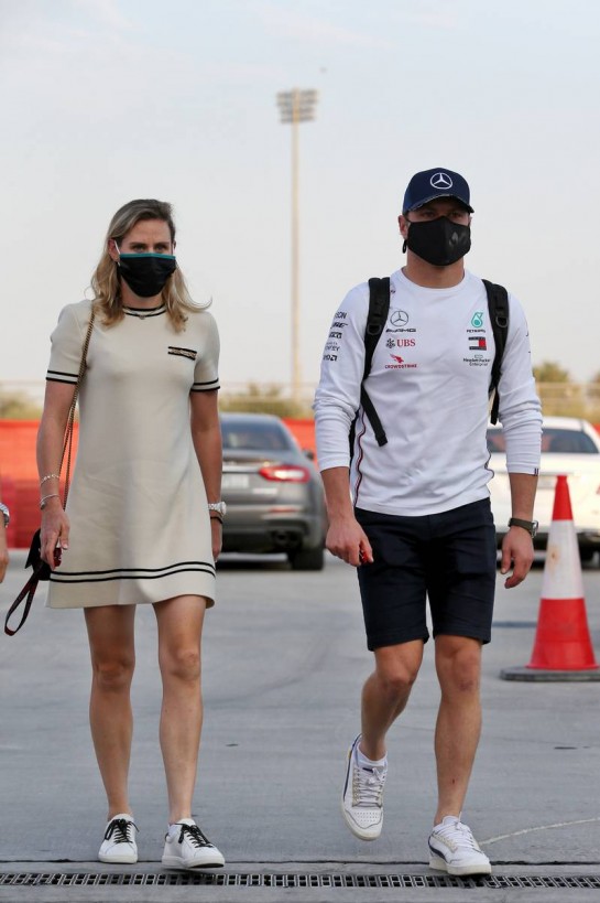 (L to R): Tiffany Cromwell (AUS) Professional Cyclist with boyfriend Valtteri Bottas (FIN) Mercedes AMG F1.
05.12.2020. Formula 1 World Championship, Rd 16, Sakhir Grand Prix, Sakhir, Bahrain, Qualifying Day.
- www.xpbimages.com, EMail: requests@xpbimages.com &copy; Copyright: Moy / XPB Images