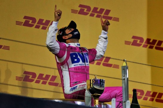 Race winner Sergio Perez (MEX) Racing Point F1 Team celebrates on the podium.
06.12.2020. Formula 1 World Championship, Rd 16, Sakhir Grand Prix, Sakhir, Bahrain, Race Day.
- www.xpbimages.com, EMail: requests@xpbimages.com &copy; Copyright: Moy / XPB Images