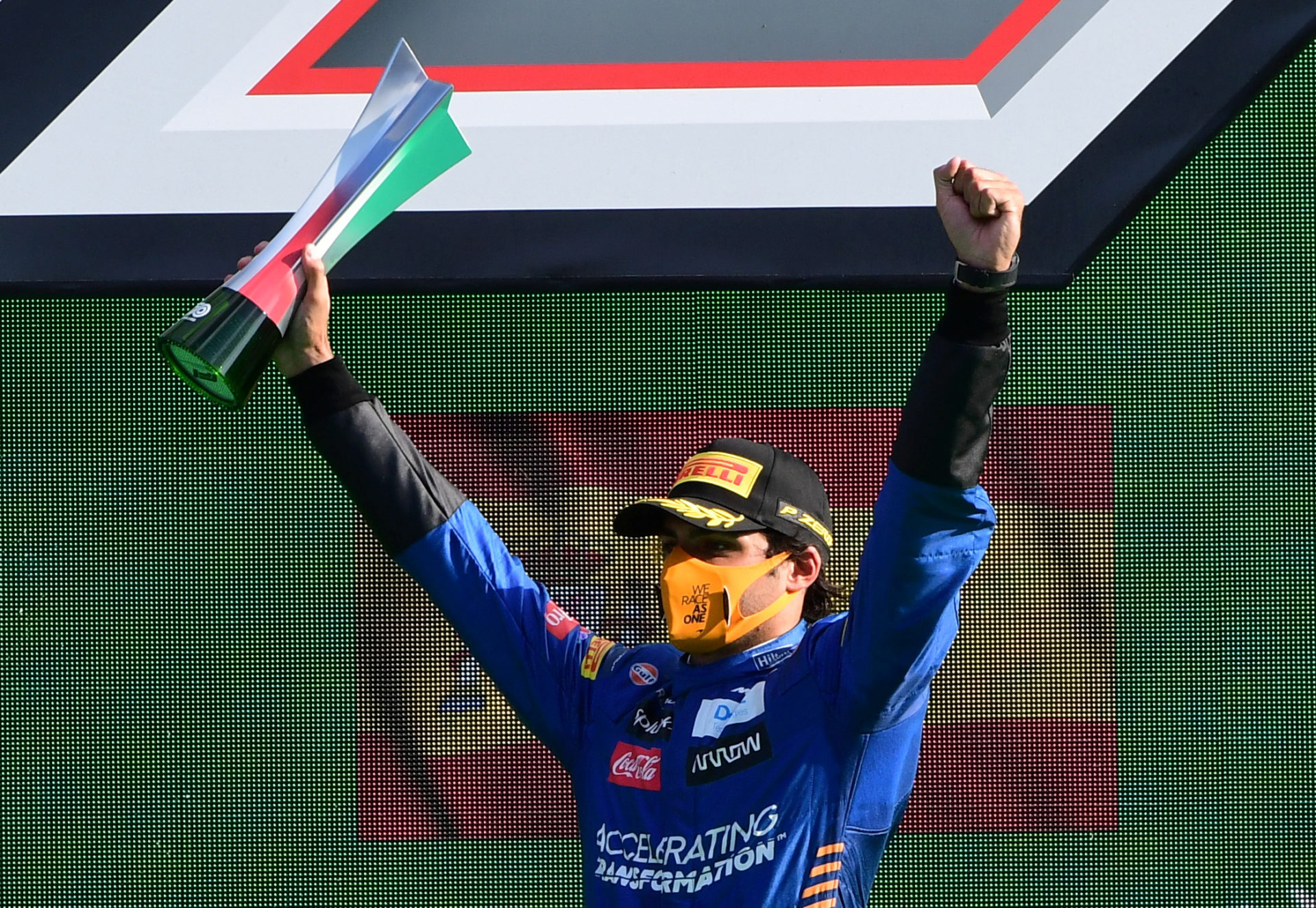 McLaren driver Carlos Sainz Jr. celebrates on the podium at Italian grand Prix F1 2020