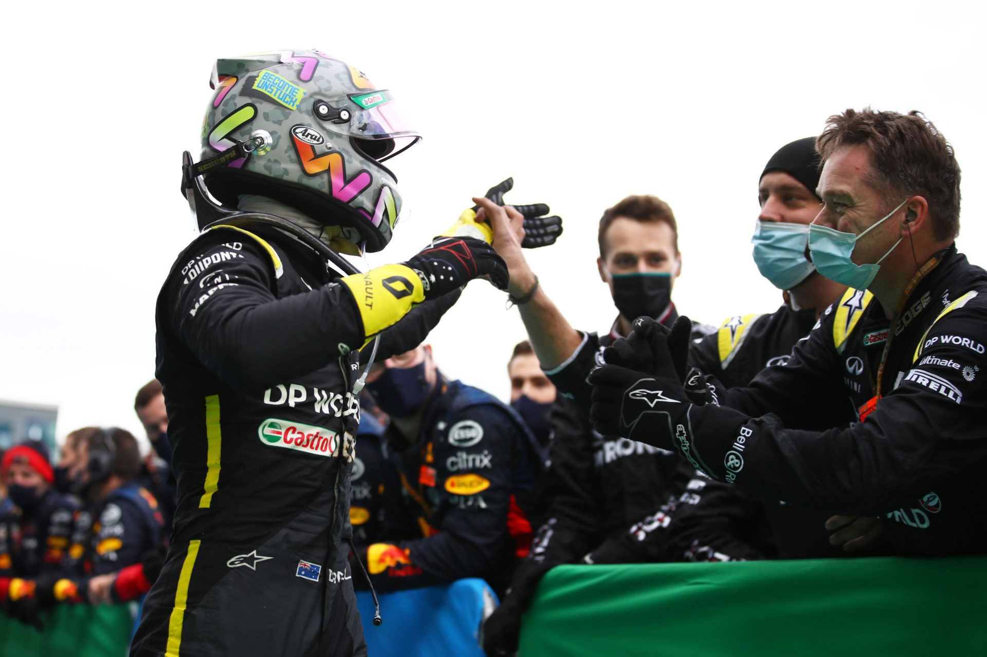 Daniel Ricciardo celebrates his podium with the team
