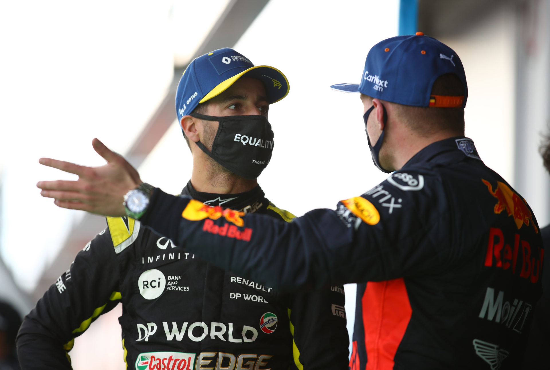 Renault's Daniel Ricciardo speaks with second placed Red Bull's Max Verstappen after the race at the Eifel Grand Prix 2020