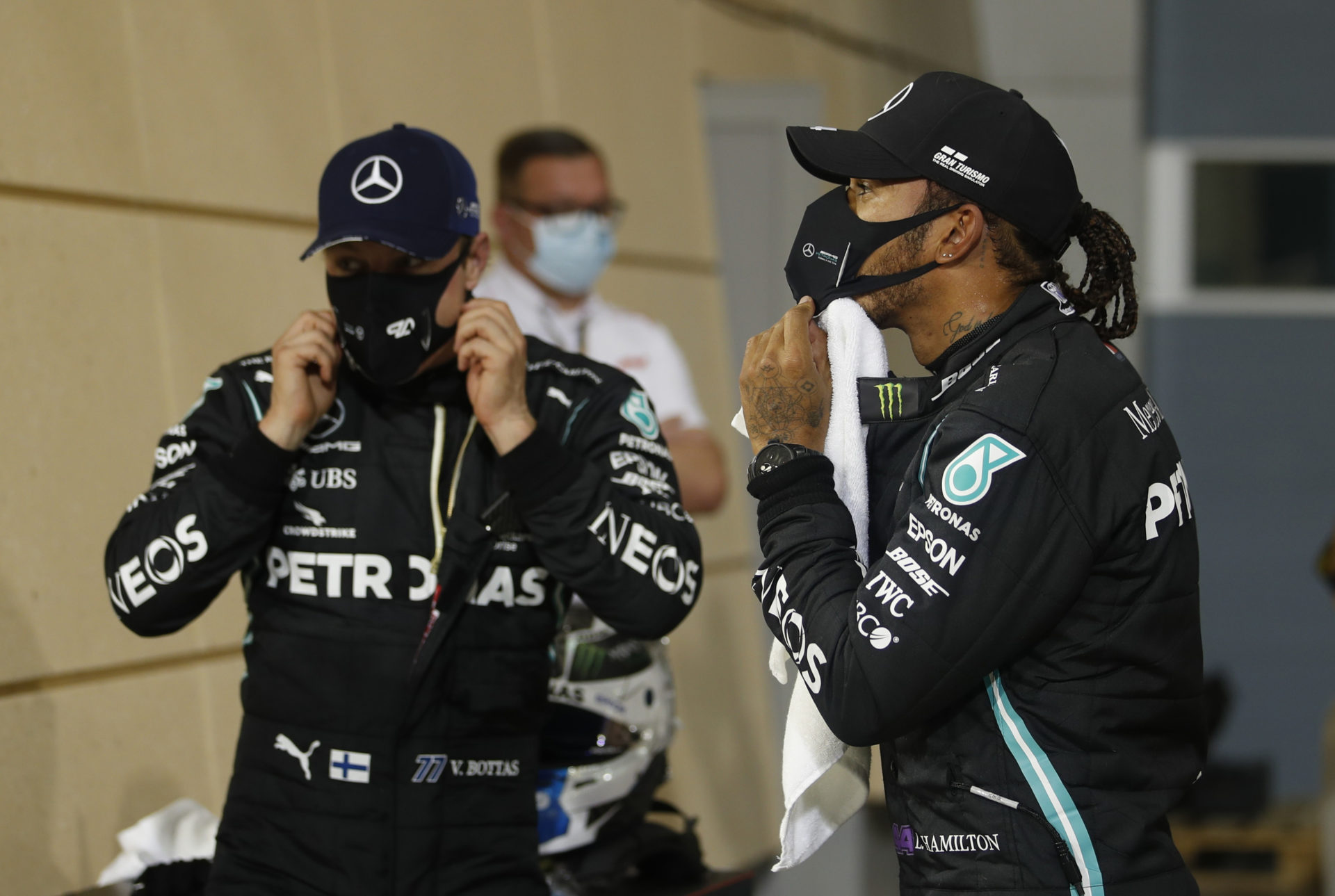 Mercedes drivers Valtteri Bottas and Lewis Hamilton after the Bahrain GP qualifying