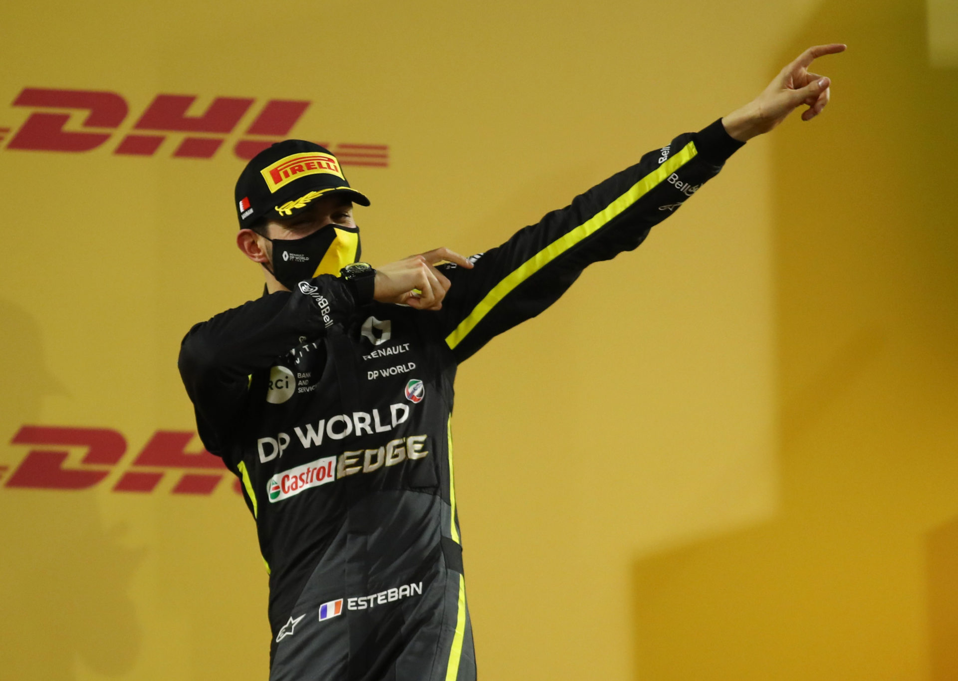 Renault racer Esteban Ocon celebrating on the podium in Sakhir GP