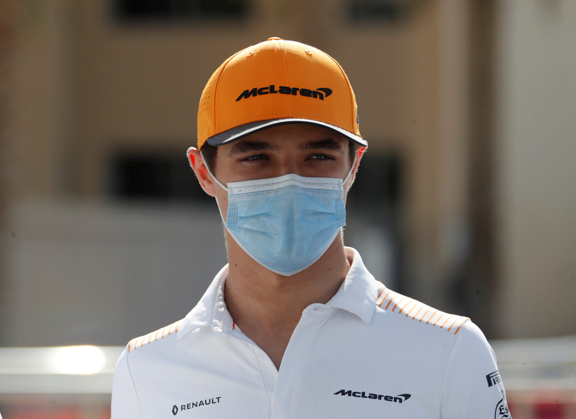 Lando Norris arrives at the Yas Marina Circuit