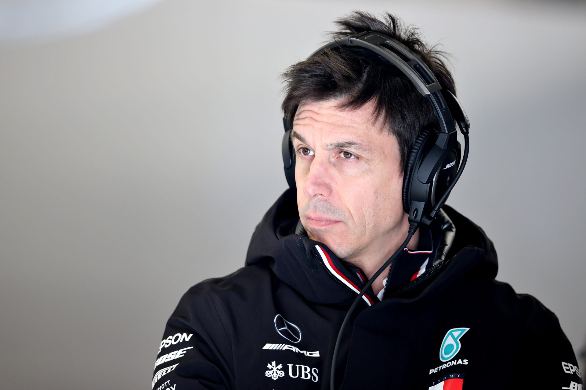 Mercedes boss Toto Wolff looks on