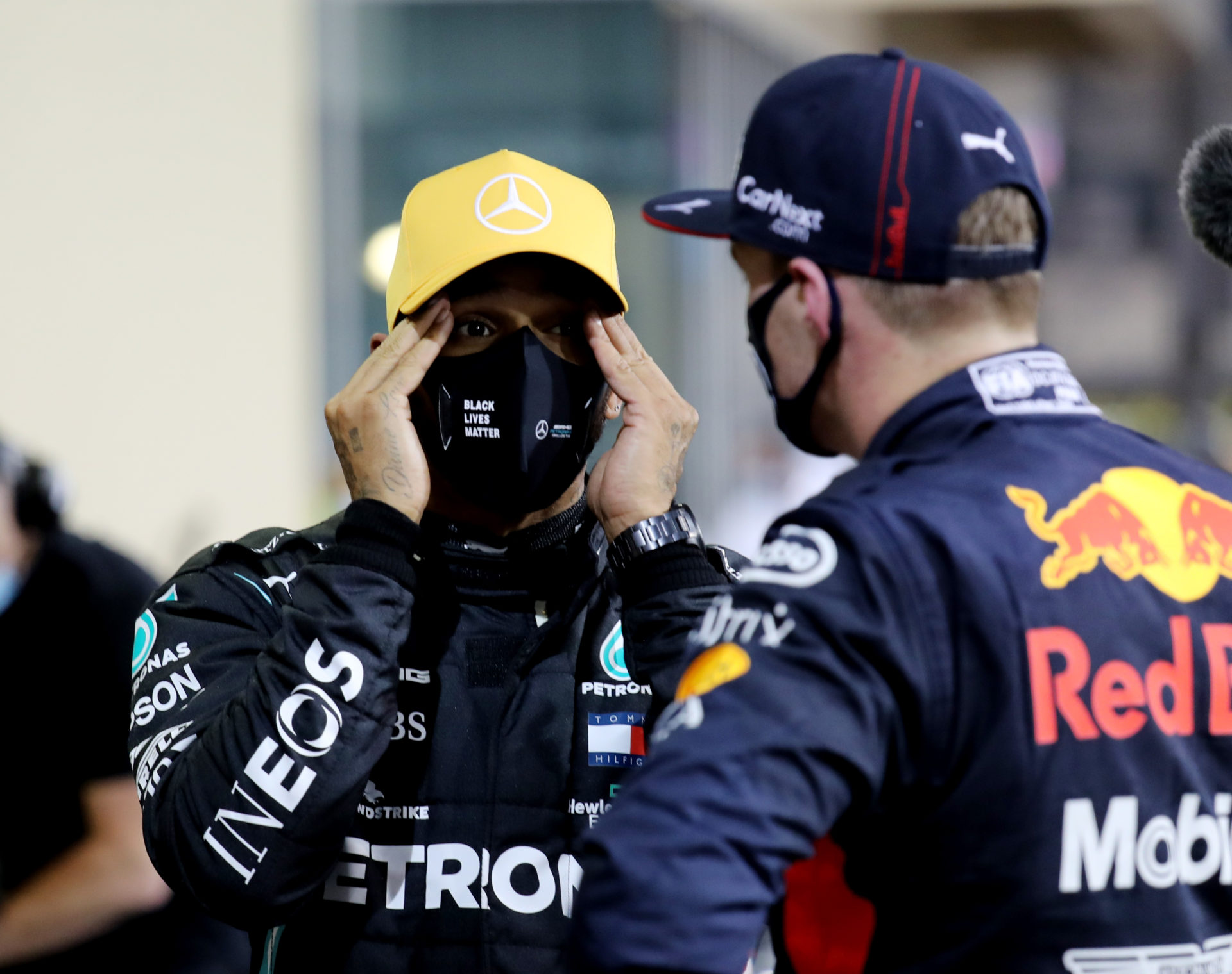 Mercedes driver Lewis Hamilton speaking with Max Verstappen after qualifying at Abu Dhabi GP 2020