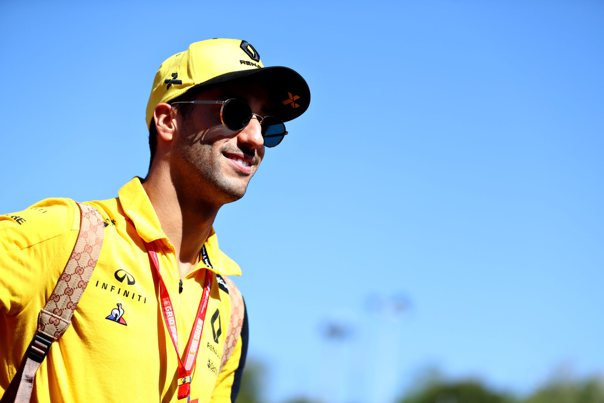 Daniel Ricciardo looks on with a smile
