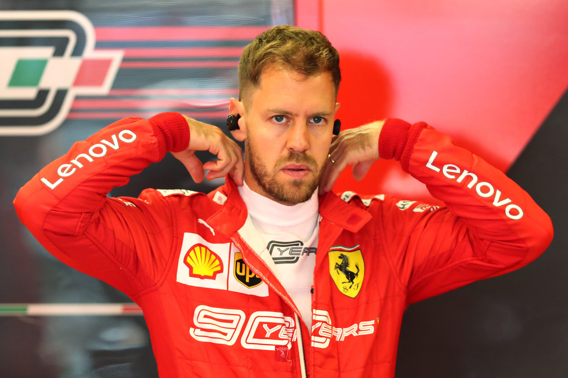 Aston Martin driver Sebastian Vettel in the garage before the Hungary Grand Prix