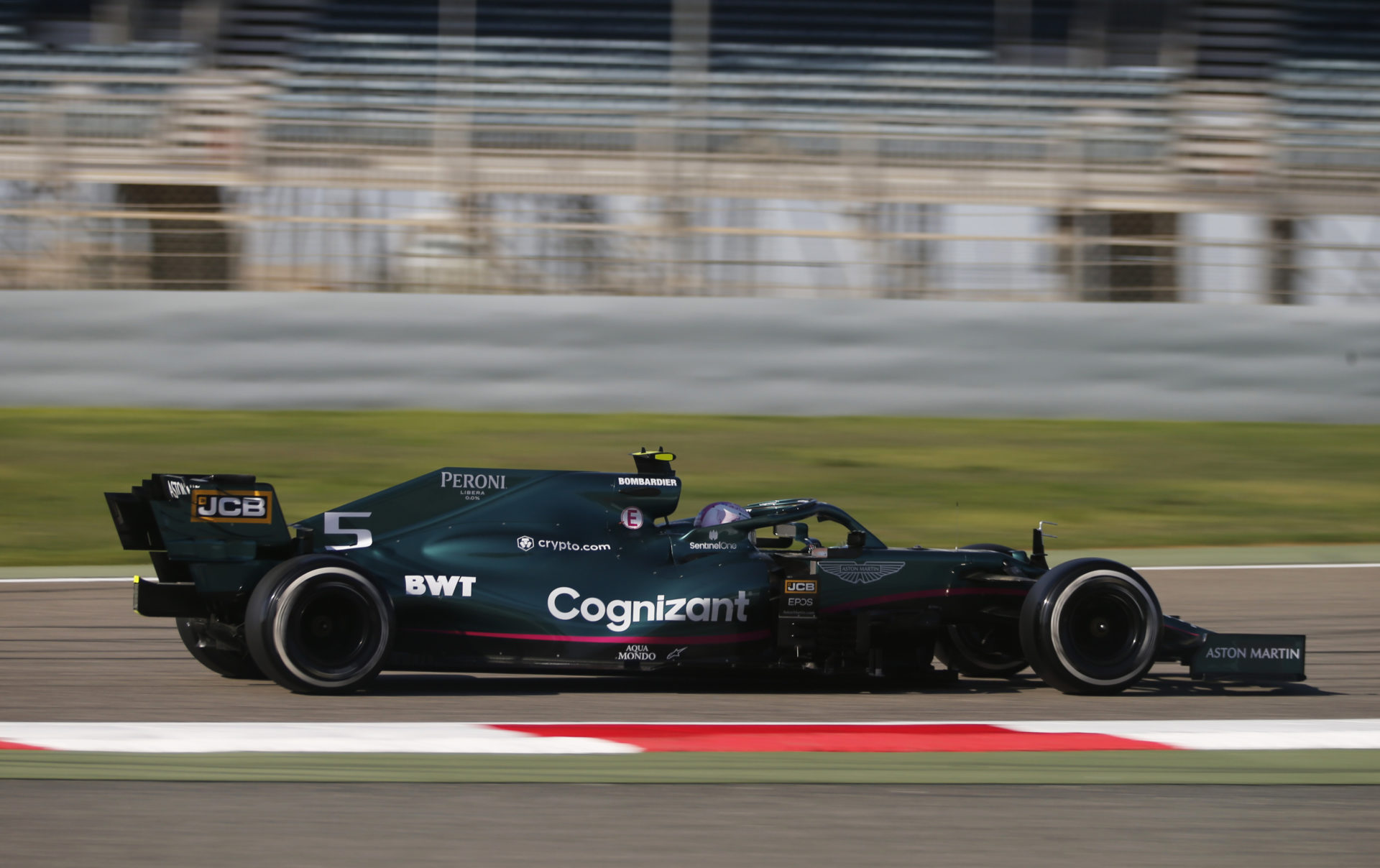 Sebastian vettel driving the aston martin during pre-season tests