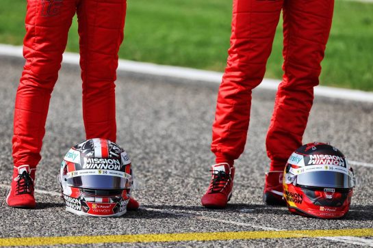 (L to R): The helmets of Charles Leclerc (MON) Ferrari and Carlos Sainz Jr (ESP) Ferrari. 
12.03.2021. Formula 1 Testing, Sakhir, Bahrain, Day One.
- www.xpbimages.com, EMail: requests@xpbimages.com &copy; Copyright: Moy / XPB Images