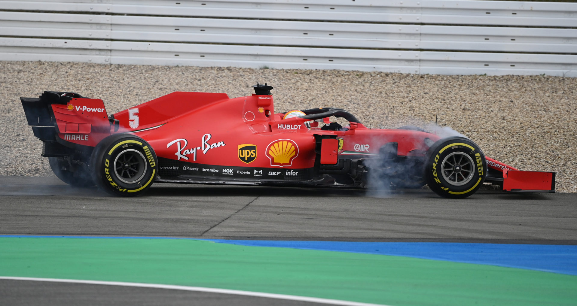 Sebastian Vettel struggles at the Eifel Grand Prix with his car