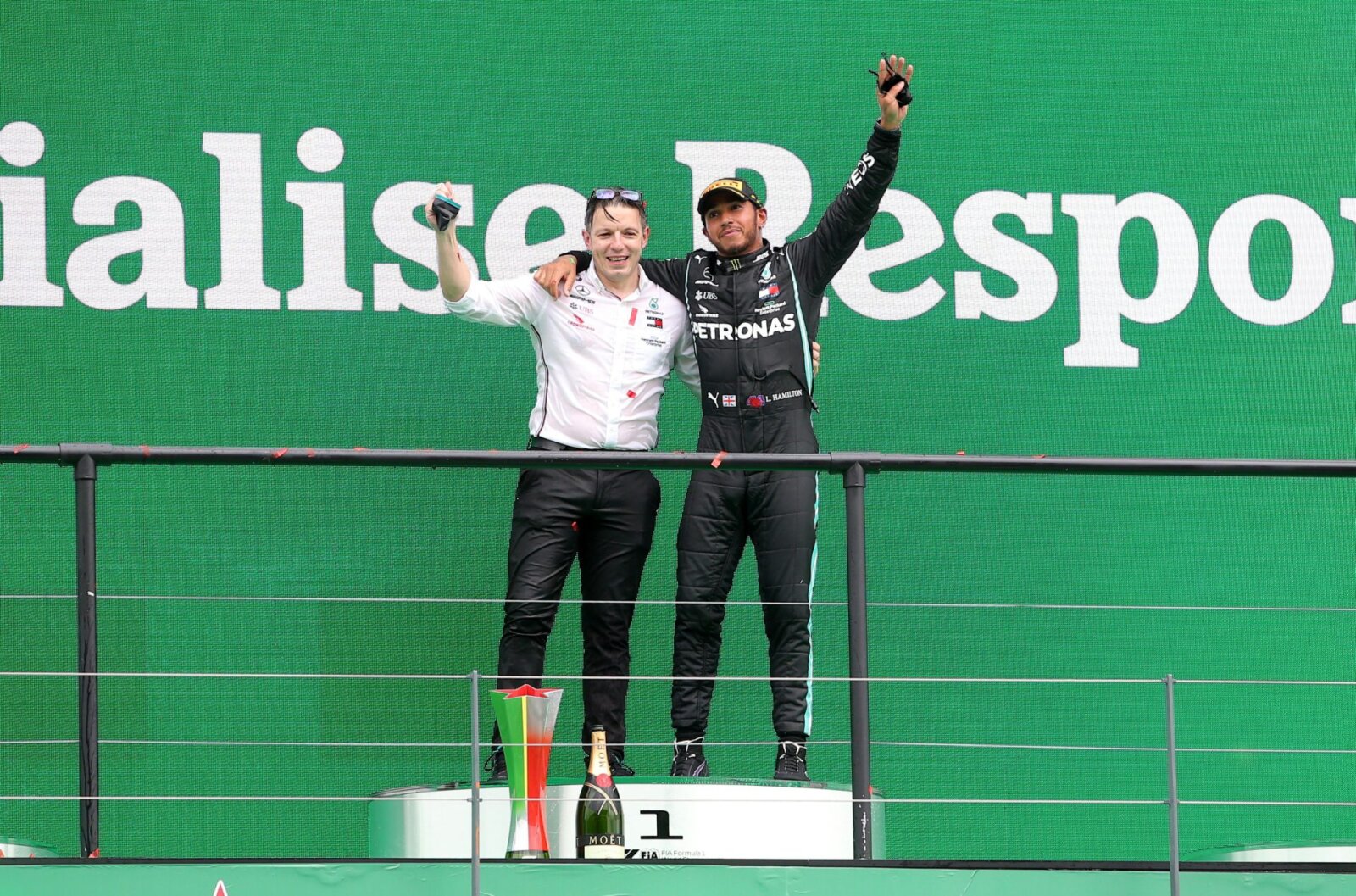 Lewis Hamilton and Peter Bonnington at the Portuguese GP podium for Mercedes