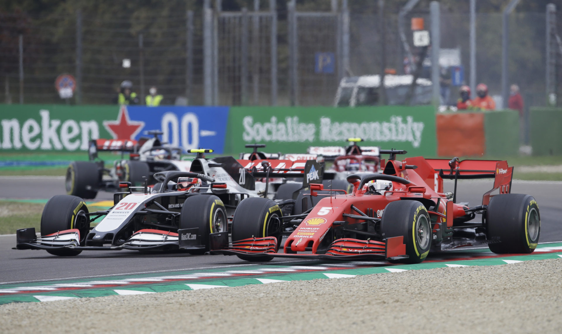 Sebastian Vettel and Kevin Magnussen second before the Haas driver is sent spinning by Vettel at the Emilia Romagna GP