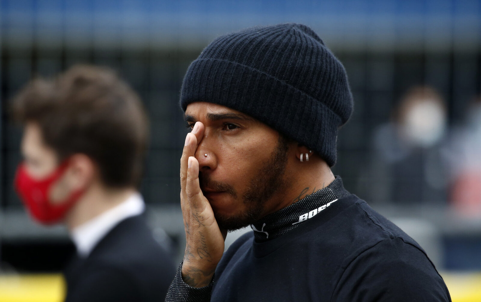 F1 driver Lewis Hamilton left with a bloodied nose