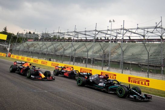 Lewis Hamilton (GBR) Mercedes AMG F1 W12 leads Sergio Perez (MEX) Red Bull Racing RB16B and Max Verstappen (NLD) Red Bull Racing RB16B at the start of the race.
18.04.2021. Formula 1 World Championship, Rd 2, Emilia Romagna Grand Prix, Imola, Italy, Race Day.
- www.xpbimages.com, EMail: requests@xpbimages.com &copy; Copyright: Bearne / XPB Images