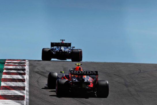 Lewis Hamilton (GBR) Mercedes AMG F1 W12 leads Sergio Perez (MEX) Red Bull Racing RB16B.
01.05.2021. Formula 1 World Championship, Rd 3, Portuguese Grand Prix, Portimao, Portugal, Qualifying Day.
 - www.xpbimages.com, EMail: requests@xpbimages.com &copy; Copyright: Staley / XPB Images