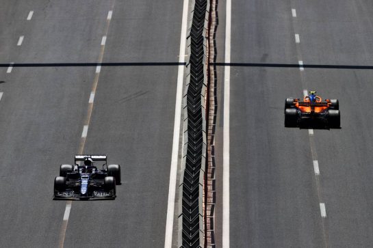 Yuki Tsunoda (JPN) AlphaTauri AT02 and Lando Norris (GBR) McLaren MCL35M.
05.06.2021. Formula 1 World Championship, Rd 6, Azerbaijan Grand Prix, Baku Street Circuit, Azerbaijan, Qualifying Day.
- www.xpbimages.com, EMail: requests@xpbimages.com &copy; Copyright: Moy / XPB Images
