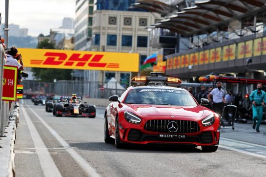 Sergio Perez (MEX) Red Bull Racing RB16B comes into the pits behind the Mercedes FIA Safety Car while the race is stopped.
06.06.2021. Formula 1 World Championship, Rd 6, Azerbaijan Grand Prix, Baku Street Circuit, Azerbaijan, Race Day.
- www.xpbimages.com, EMail: requests@xpbimages.com &copy; Copyright: Charniaux / XPB Images