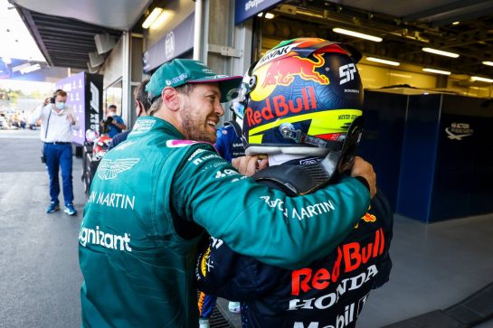 (L to R): Sebastian Vettel (GER) Aston Martin F1 Team celebrates his second position with race winner Sergio Perez (MEX) Red Bull Racing in parc ferme.
06.06.2021. Formula 1 World Championship, Rd 6, Azerbaijan Grand Prix, Baku Street Circuit, Azerbaijan, Race Day.
- www.xpbimages.com, EMail: requests@xpbimages.com &copy; Copyright: FIA Pool Image for Editorial Use Only