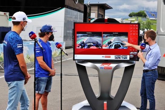 (L to R): George Russell (GBR) Williams Racing and Fernando Alonso (ESP) Alpine F1 Team with Anthony Davidson (GBR) Sky Sports F1 Presenter.
25.06.2021. Formula 1 World Championship, Rd 8, Steiermark Grand Prix, Spielberg, Austria, Practice Day.
- www.xpbimages.com, EMail: requests@xpbimages.com © Copyright: Moy / XPB Images