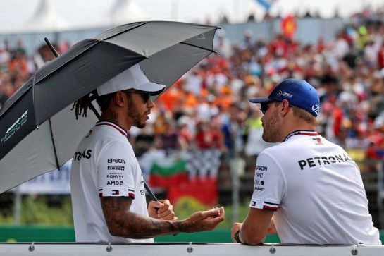 (L to R): Lewis Hamilton (GBR) Mercedes AMG F1 and team mate Valtteri Bottas (FIN) Mercedes AMG F1 on the drivers parade.
01.08.2021. Formula 1 World Championship, Rd 11, Hungarian Grand Prix, Budapest, Hungary, Race Day.
- www.xpbimages.com, EMail: requests@xpbimages.com &copy; Copyright: Moy / XPB Images