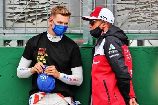 (L to R): Mick Schumacher (GER) Haas F1 Team with Kimi Raikkonen (FIN) Alfa Romeo Racing on the grid.
01.08.2021. Formula 1 World Championship, Rd 11, Hungarian Grand Prix, Budapest, Hungary, Race Day.
- www.xpbimages.com, EMail: requests@xpbimages.com &copy; Copyright: Batchelor / XPB Images
