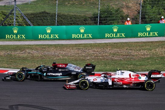Lewis Hamilton (GBR) Mercedes AMG F1 W12 and Antonio Giovinazzi (ITA) Alfa Romeo Racing C41 battle for position.
01.08.2021. Formula 1 World Championship, Rd 11, Hungarian Grand Prix, Budapest, Hungary, Race Day.
- www.xpbimages.com, EMail: requests@xpbimages.com &copy; Copyright: Moy / XPB Images