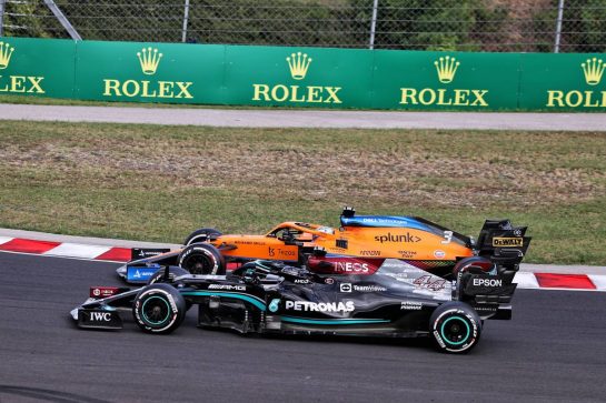 Lewis Hamilton (GBR) Mercedes AMG F1 W12 and Daniel Ricciardo (AUS) McLaren MCL35M battle for position.
01.08.2021. Formula 1 World Championship, Rd 11, Hungarian Grand Prix, Budapest, Hungary, Race Day.
- www.xpbimages.com, EMail: requests@xpbimages.com &copy; Copyright: Moy / XPB Images