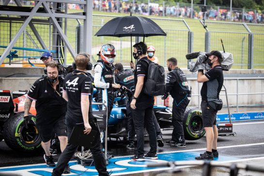 Esteban Ocon (FRA) Alpine F1 Team A521 in the pits as the race is stopped.
01.08.2021. Formula 1 World Championship, Rd 11, Hungarian Grand Prix, Budapest, Hungary, Race Day.
- www.xpbimages.com, EMail: requests@xpbimages.com &copy; Copyright: Bearne / XPB Images