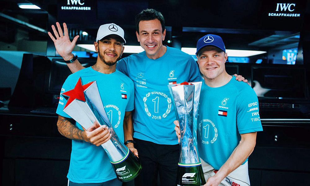 Toto Wolff, Lewis Hamilton and Valtteri Bottas celebrate title success in Brazil in 2018.