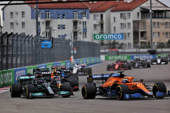 Lewis Hamilton (GBR) Mercedes AMG F1 W12 and Daniel Ricciardo (AUS) McLaren MCL35M battle for position at the start of the race.
26.09.2021. Formula 1 World Championship, Rd 15, Russian Grand Prix, Sochi Autodrom, Sochi, Russia, Race Day.
- www.xpbimages.com, EMail: requests@xpbimages.com &copy; Copyright: Batchelor / XPB Images