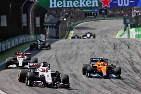 Nikita Mazepin (RUS) Haas F1 Team VF-21 and Lando Norris (GBR) McLaren MCL35M.
14.11.2021. Formula 1 World Championship, Rd 19, Brazilian Grand Prix, Sao Paulo, Brazil, Race Day.
- www.xpbimages.com, EMail: requests@xpbimages.com &copy; Copyright: Batchelor / XPB Images