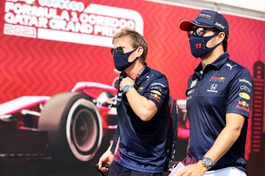 Sergio Perez (MEX) Red Bull Racing (Right) with Xavi Martos (ESP) Red Bull Racing F1 Team Physio.
19.11.2021 Formula 1 World Championship, Rd 20, Qatar Grand Prix, Doha, Qatar, Practice Day.
- www.xpbimages.com, EMail: requests@xpbimages.com © Copyright: Batchelor / XPB Images
