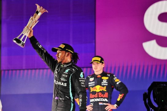 Race winner Lewis Hamilton (GBR) Mercedes AMG F1 celebrates on the podium.
05.12.2021. Formula 1 World Championship, Rd 21, Saudi Arabian Grand Prix, Jeddah, Saudi Arabia, Race Day.
- www.xpbimages.com, EMail: requests@xpbimages.com &copy; Copyright: Moy / XPB Images
