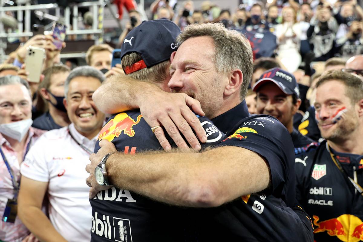 1st place and new World Champion, Max Verstappen (NLD) Red Bull Racing RB16B and Christian Horner (GBR) Red Bull Racing Team Principal. 12.12.2021. Formula 1 World Championship, Rd 22, Abu Dhabi Grand Prix, Yas Marina