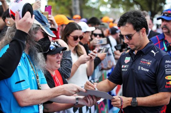Sergio Perez (MEX) Red Bull Racing signs autographs for the fans.
07.04.2022. Formula 1 World Championship, Rd 3, Australian Grand Prix, Albert Park, Melbourne, Australia, Preparation Day.
- www.xpbimages.com, EMail: requests@xpbimages.com © Copyright: Coates / XPB Images