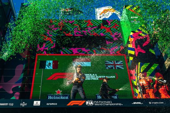 (L to R): second placed Sergio Perez (MEX) Red Bull Racing; third placed George Russell (GBR) Mercedes AMG F1, and race winner Charles Leclerc (MON) Ferrari, celebrate with the champagne on the podium.
10.04.2022. Formula 1 World Championship, Rd 3, Australian Grand Prix, Albert Park, Melbourne, Australia, Race Day.
- www.xpbimages.com, EMail: requests@xpbimages.com © Copyright: Bearne / XPB Images