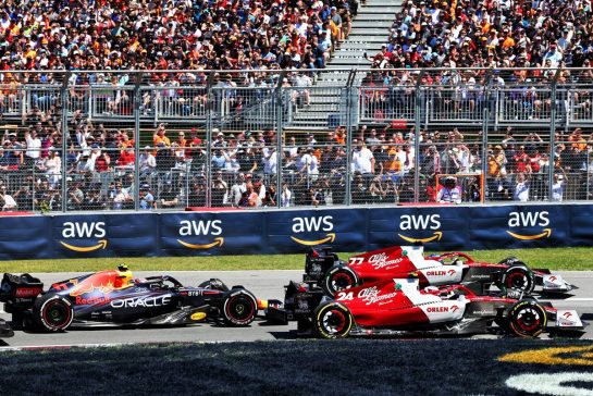 Guanyu Zhou (CHN) Alfa Romeo F1 Team C42; Valtteri Bottas (FIN) Alfa Romeo F1 Team C42; and Sergio Perez (MEX) Red Bull Racing RB18 at the start of the race.
19.06.2022. Formula 1 World Championship, Rd 9, Canadian Grand Prix, Montreal, Canada, Race Day.
- www.xpbimages.com, EMail: requests@xpbimages.com &copy; Copyright: Charniaux / XPB Images
