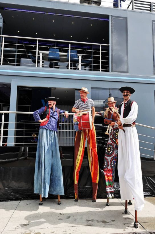 Paddock atmosphere - men on stilts.
31.07.2022. Formula 1 World Championship, Rd 13, Hungarian Grand Prix, Budapest, Hungary, Race Day.
- www.xpbimages.com, EMail: requests@xpbimages.com © Copyright: Moy / XPB Images