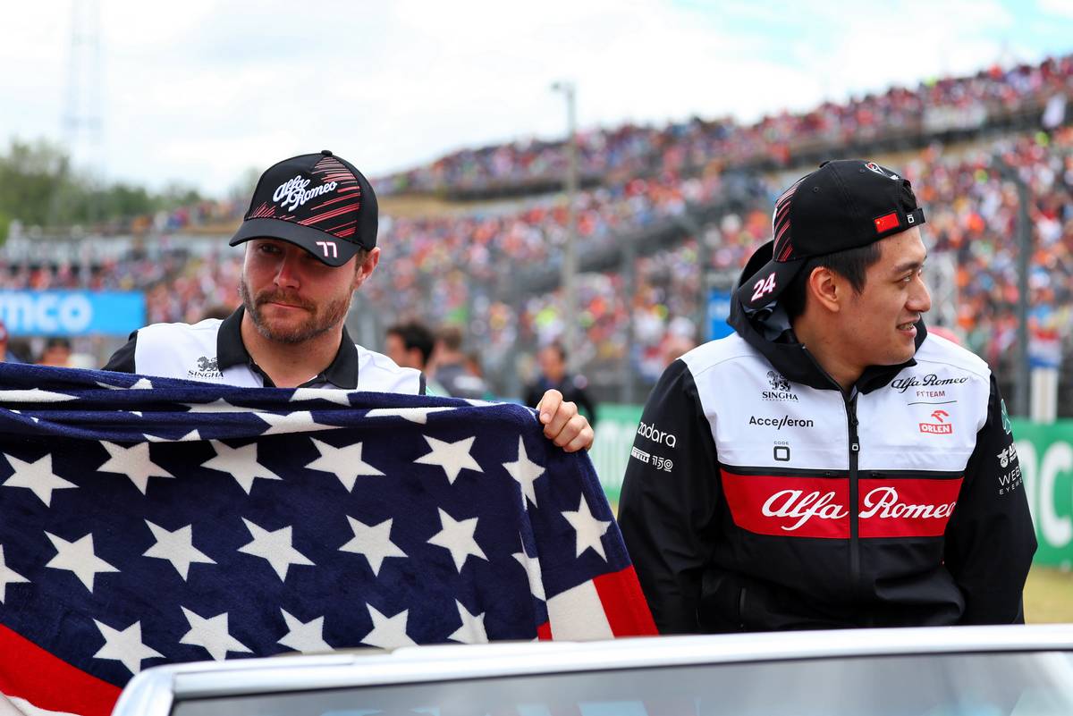 Valtteri Bottas (FIN) Alfa Romeo F1 Team and team mate Guanyu Zhou (CHN) Alfa Romeo F1 Team on the drivers parade. 31.07.2022. Formula 1 World Championship, Rd 13, Hungarian Grand Prix, Budapest, Hungary, Race