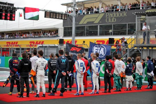 Drivers as the grid observes the national anthem.
31.07.2022. Formula 1 World Championship, Rd 13, Hungarian Grand Prix, Budapest, Hungary, Race Day.
- www.xpbimages.com, EMail: requests@xpbimages.com © Copyright: Coates / XPB Images