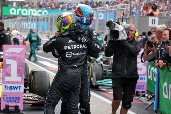George Russell (GBR) Mercedes AMG F1 celebrates his third position with second placed team mate Lewis Hamilton (GBR) Mercedes AMG F1 in parc ferme.
31.07.2022. Formula 1 World Championship, Rd 13, Hungarian Grand Prix, Budapest, Hungary, Race Day.
- www.xpbimages.com, EMail: requests@xpbimages.com © Copyright: Bearne / XPB Images