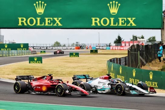 Charles Leclerc (MON) Ferrari F1-75 and George Russell (GBR) Mercedes AMG F1 W13 battle for position.
31.07.2022. Formula 1 World Championship, Rd 13, Hungarian Grand Prix, Budapest, Hungary, Race Day.
- www.xpbimages.com, EMail: requests@xpbimages.com © Copyright: Moy / XPB Images